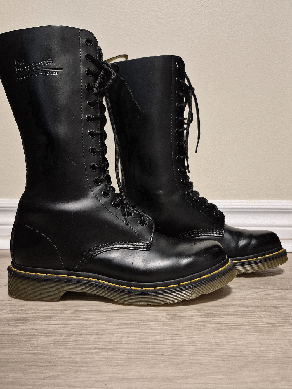 Dr. Martens Black 14-Eye Tall Lace-Up Combat Boots with Yellow Welt Stitch